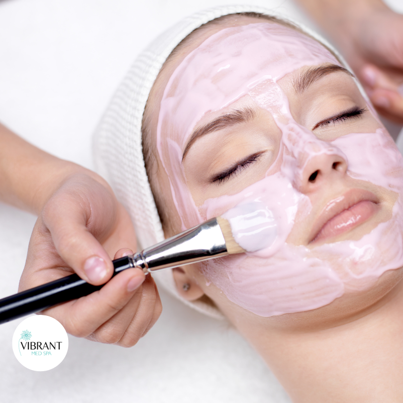 woman-eyes-closed-facemask-application-vibrant-med-spa-roundrock